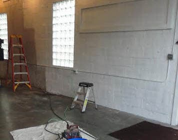 Interior wall being repainted a clean white