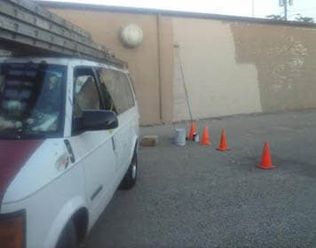 Large commercial warehouse mid-repaint